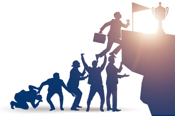 Career progression concept with businessman climbing stairs