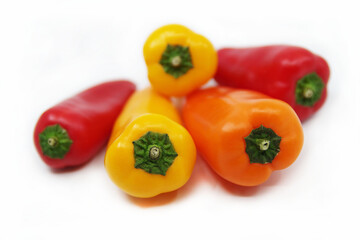 Small sweet peppers isolated on a white background.