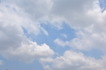 Fototapeta premium Bright Blue sky with white cloud. Beautiful sky background and wallpaper. Clear day and good weather in the morning. 