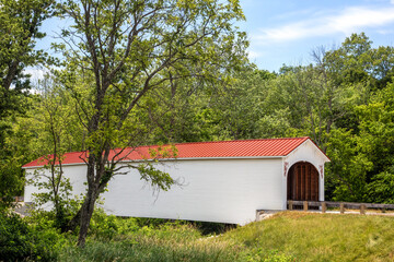 Reconstructed in 2019, Cedar Ford Covered Bridge, spans Bean Blossom Creek in rural Monroe County,...