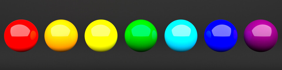 Set colored spheres on black background 