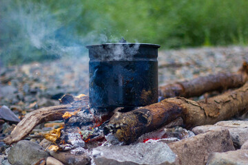 pot on a fire in nature
