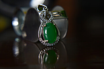 Gemstones jewelery
Is a pendant necklace decorated with green jade