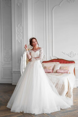 Fototapeta premium portrait of the bride looking thoughtfully aside