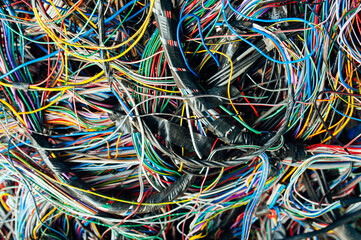 lots of colorful tangled wires in one pile