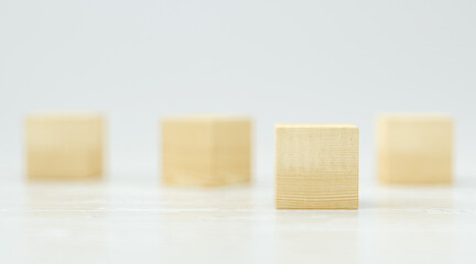 empty wooden cubes for own messages and icons on white background