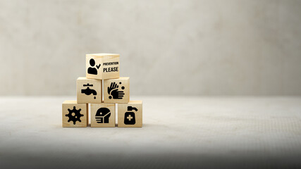 cubes with anti-virus tips and message PREVENTION PLEASE on concrete background