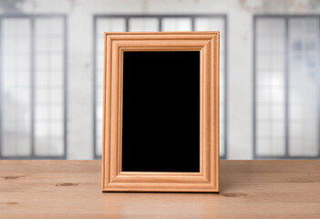 old photo frame on the wooden table