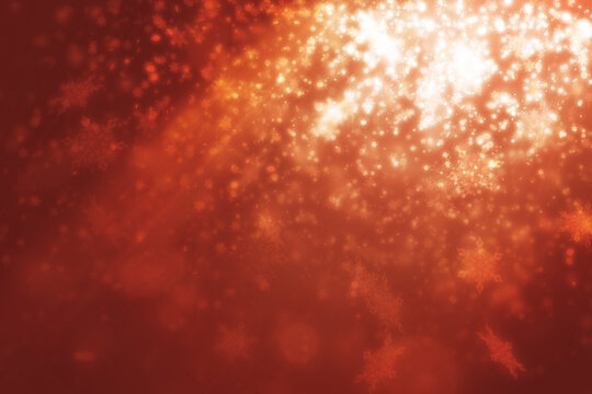 Red spot light effect with snowflakes light and mini glitter floating on red christmas background