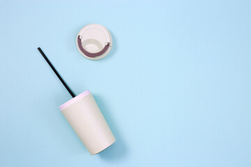 Reusable eco coffee cup and metal drinking straw. Zero waste concept