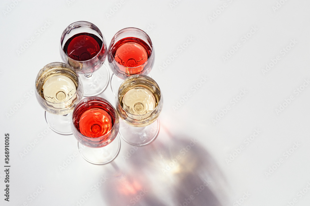 Wall mural set of wine in glasses. view from above