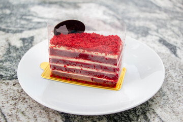 Red velvet cake and sliced black chocolate