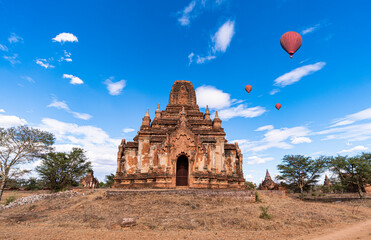 Fototapeta na wymiar A multiple beauty colorful hot air balloons flying over ancient pagoda Bagan,Myanmar
