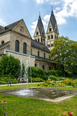 Fototapeta premium Fountain near the walls of the Basilica of St. Castor in the city of Koblenz