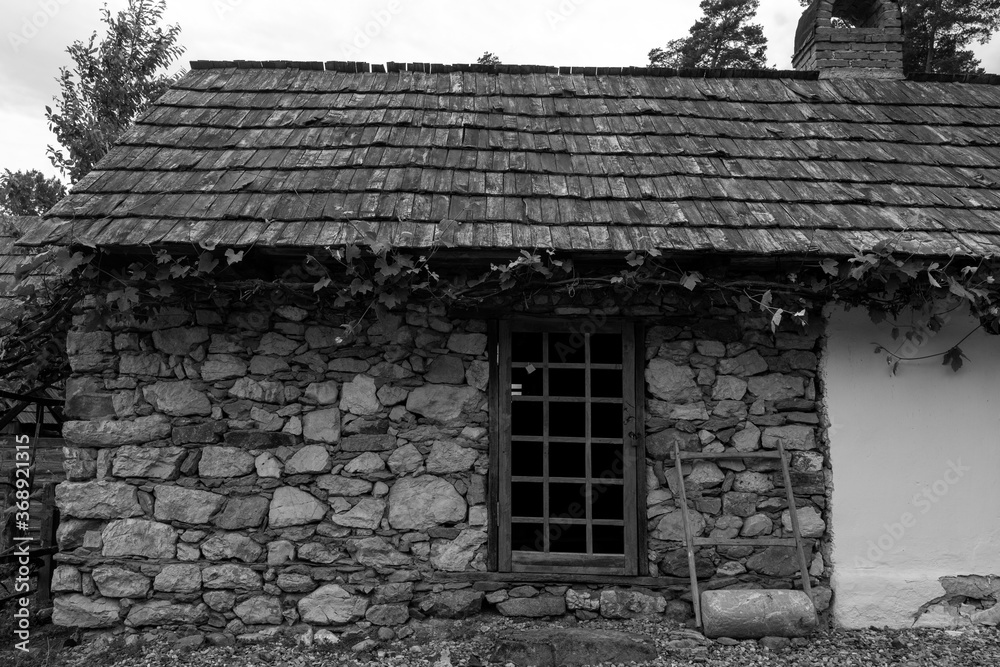 Wall mural traditional house made of straw and clay in the mountain village