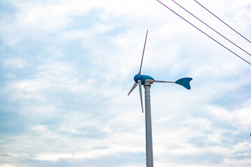 wind turbine against blue sky