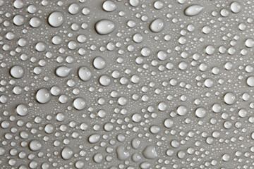 Large number of water drops. Abstract background texture. Waterfalls on a solid background, collecting bubbles on a clean surface. Raindrops, a series of natural photographs