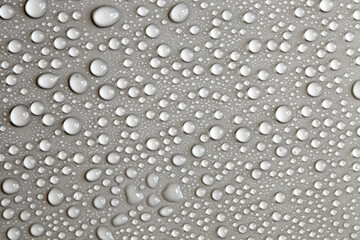 Large number of water drops. Abstract background texture. Waterfalls on a solid background, collecting bubbles on a clean surface. Raindrops, a series of natural photographs