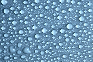 Details of water droplets, moisture condensation, hot water vapor condensation on a neutral background close-up
