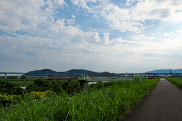 Fototapeta na wymiar Blue sky on the banks of the Kizugawa River in Kyoto, Japan on July 19, 2020.