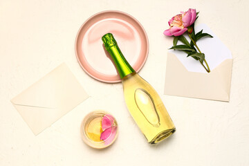Composition with bottle of champagne on light background