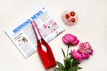 Composition with bottle of champagne on light background