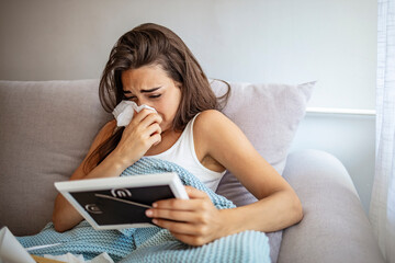 Break-up. Depressed young women holding a photo frame and crying. Longing woman with handkerchief looking at frame. Sad Depressed Girl Crying After Break-up Holding Framed Picture.