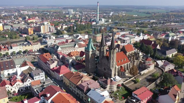 View from drone of ancient Gothic Archdeacon Church of St. Bartholomew in old Czech town of Kolin on Elbe River, Central Bohemian Region