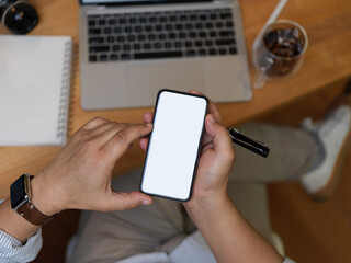 Male office worker using smartphone with clipping path