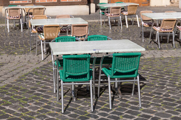 empty tables and chairs