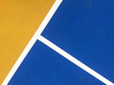 colorful basketball lines on an outdoor court
