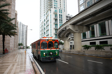 MIAMI BEACH, USA - MAY, 2020: Miami Trolley free public transportation on Avenue. Downtown of the city of Miami, US.