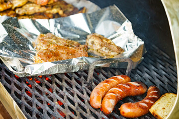 Meat grilling on grill