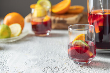 Sangria  drink glass on cocnrete background. Famous Spanish summer beverage.Copy space
