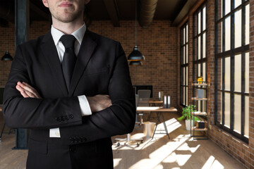 businessman with crossed arms in large industrial office loft, 3D Illustration