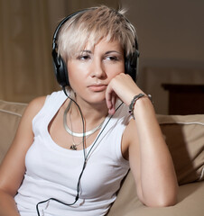 music - young woman with headphones