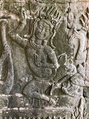 Fototapeta na wymiar Elaborate decorative carving on temple wall. 