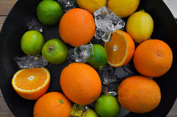 orange lime lemon ice in a bowl