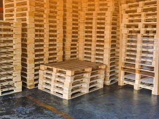 Wooden pallets stack at the freight cargo warehouse storage for shipment box container in transportation and logistics industrial 