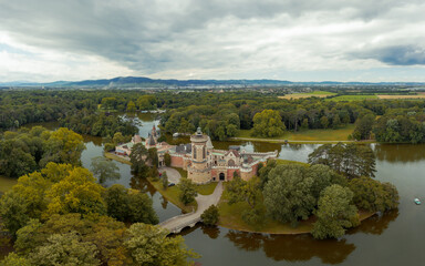 Fototapeta na wymiar Franzensburg castle in Austria. Built between 1801 and 1836, it was named in memory of the last Holy Roman Emperor, Francis II, who died in 1835. Amazing area, lake, forest, fields. recreation place.