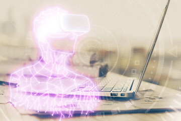 Fototapeta na wymiar Computer on desktop with AR theme icon. Multi exposure. Concept of augmented reality.