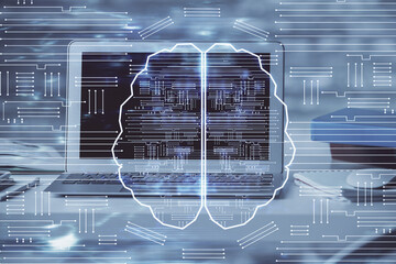 Multi exposure of work table with computer and brain hologram. Brainstorm concept.