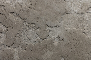 Abstract gray concrete wall plaster texture.