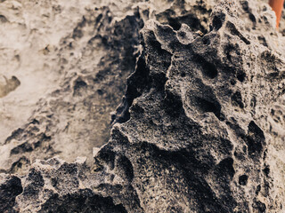 Mystic dark moon surface. Astrology, astronomy, paranormal activity concept or scary supernatural planet landscape. Dramatic toned photo of natural textures. Vietnam Hang Rai close view of black coral