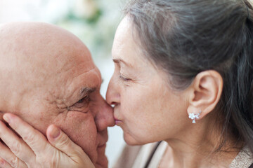 Fototapeta premium cute elderly couple in light interior.
