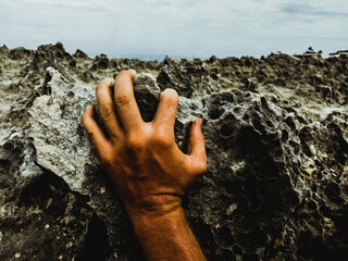 Close view of hand on Mystic dark moon surface. Astrology, astronomy, paranormal activity concept...