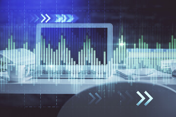 Financial market graph hologram and personal computer on background. Double exposure. Concept of forex.
