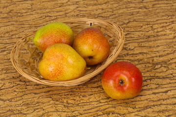 Pear heap in the wooden basket