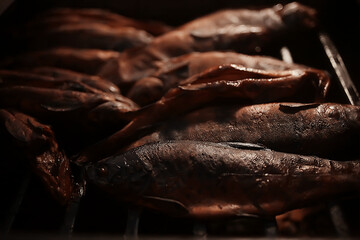 trout grill on charcoal / fried fish trout on coals, trek food