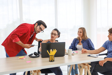 Group of business people or creative designer talking and meeting or discussion in conference room, team brainstorming new marketing project, colleagues teamwork working together